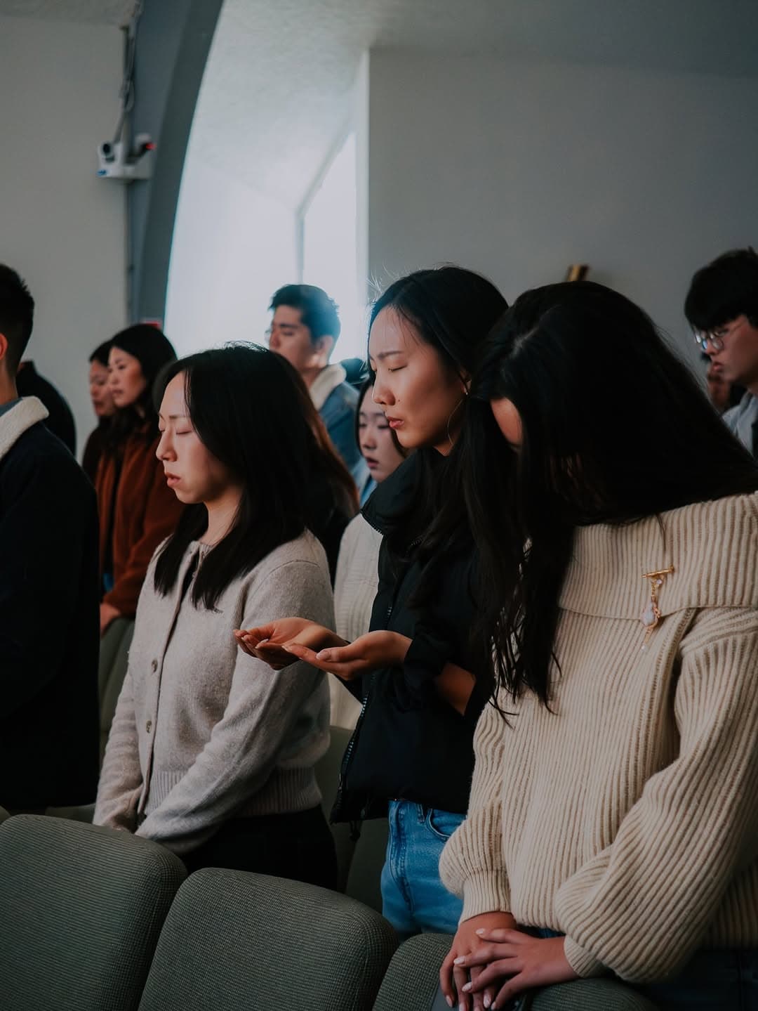 Congregation in worship and prayer