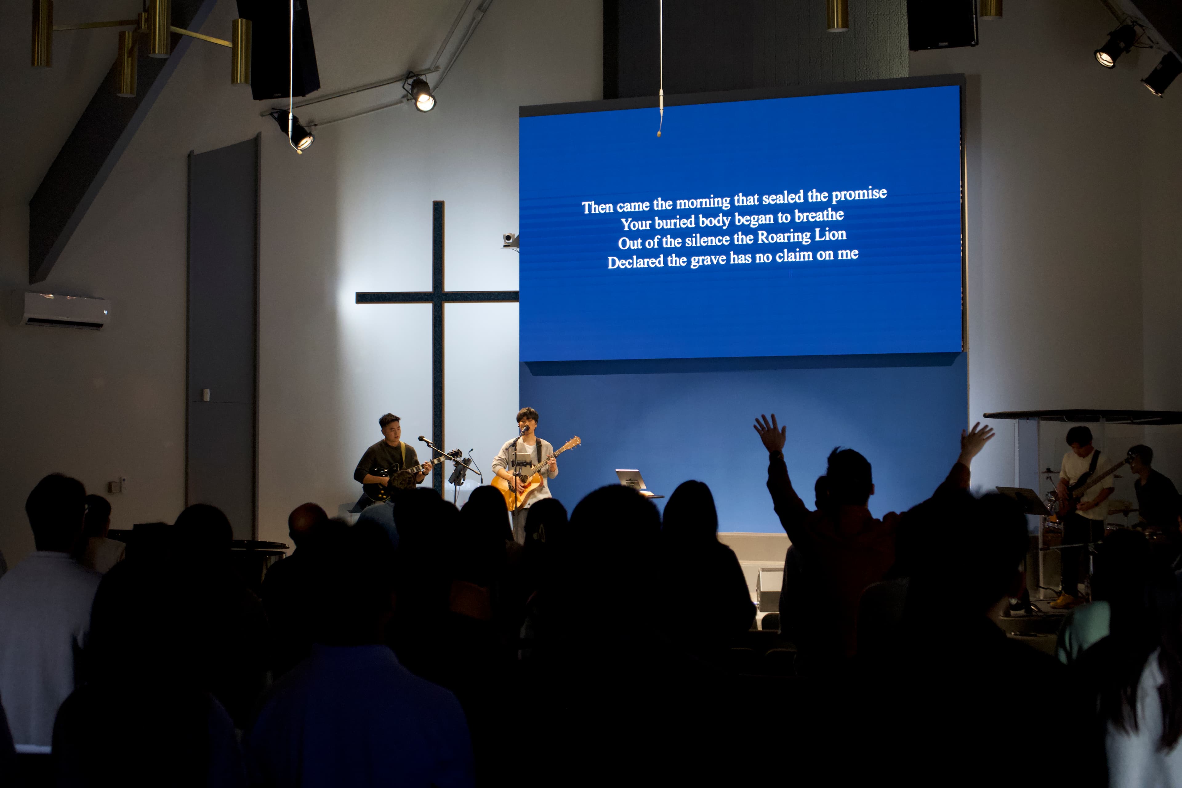 Worship service with band and congregation
